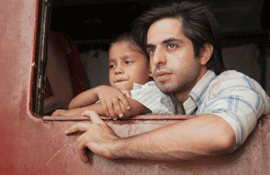  “Saleem” (Satya Bhabha) returns to Bombay with his son “Aadam”