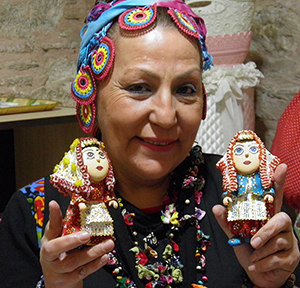 Funda Demirel is an award-winning artist, educator, and activist who is training women and girls in  traditional Turkish art forms. Her goals are to help them heal from the pain of domestic violence and gain economic independence by teaching  them to preserve Turkey's rich handicraft traditions.